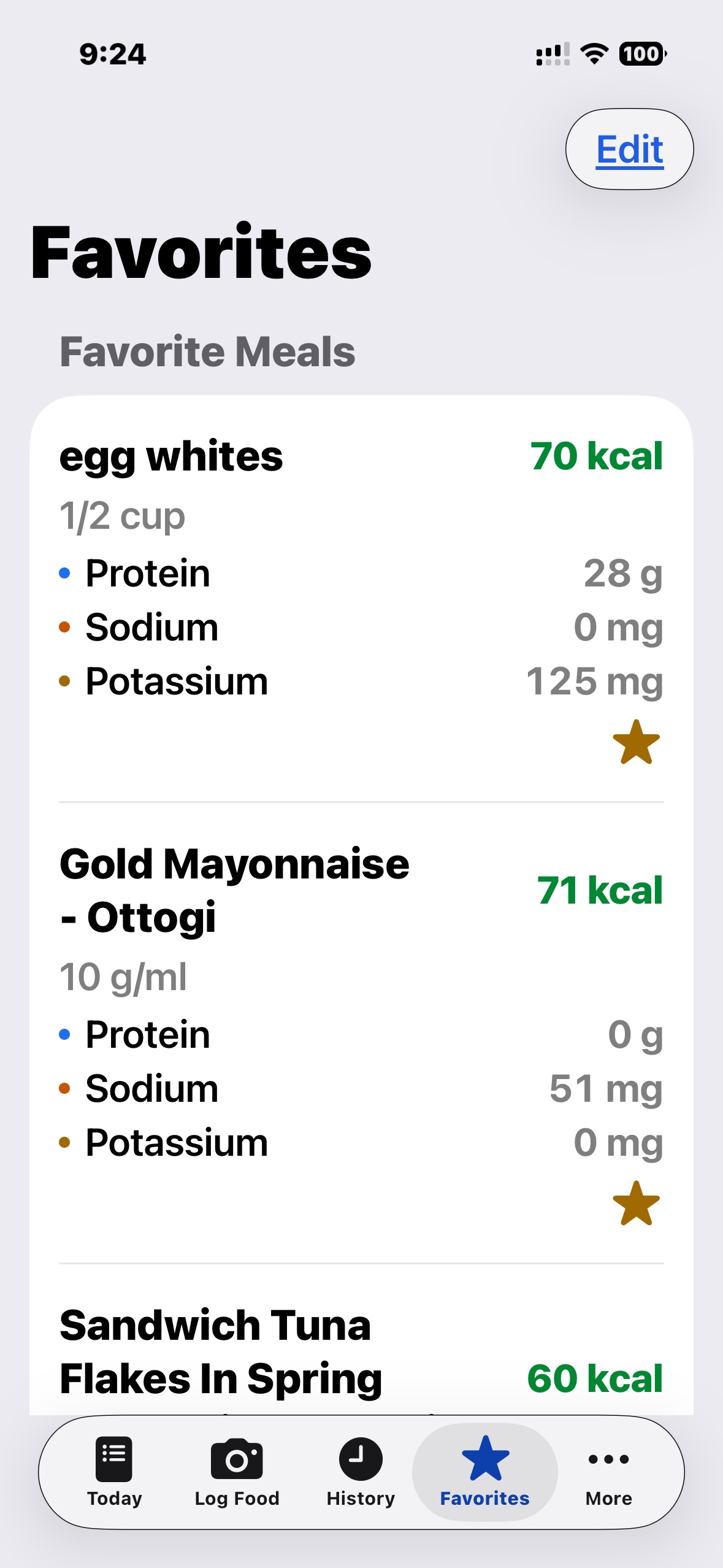 Favorites screen showing saved meals with quick nutrient readouts